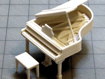三角钢琴和凳子